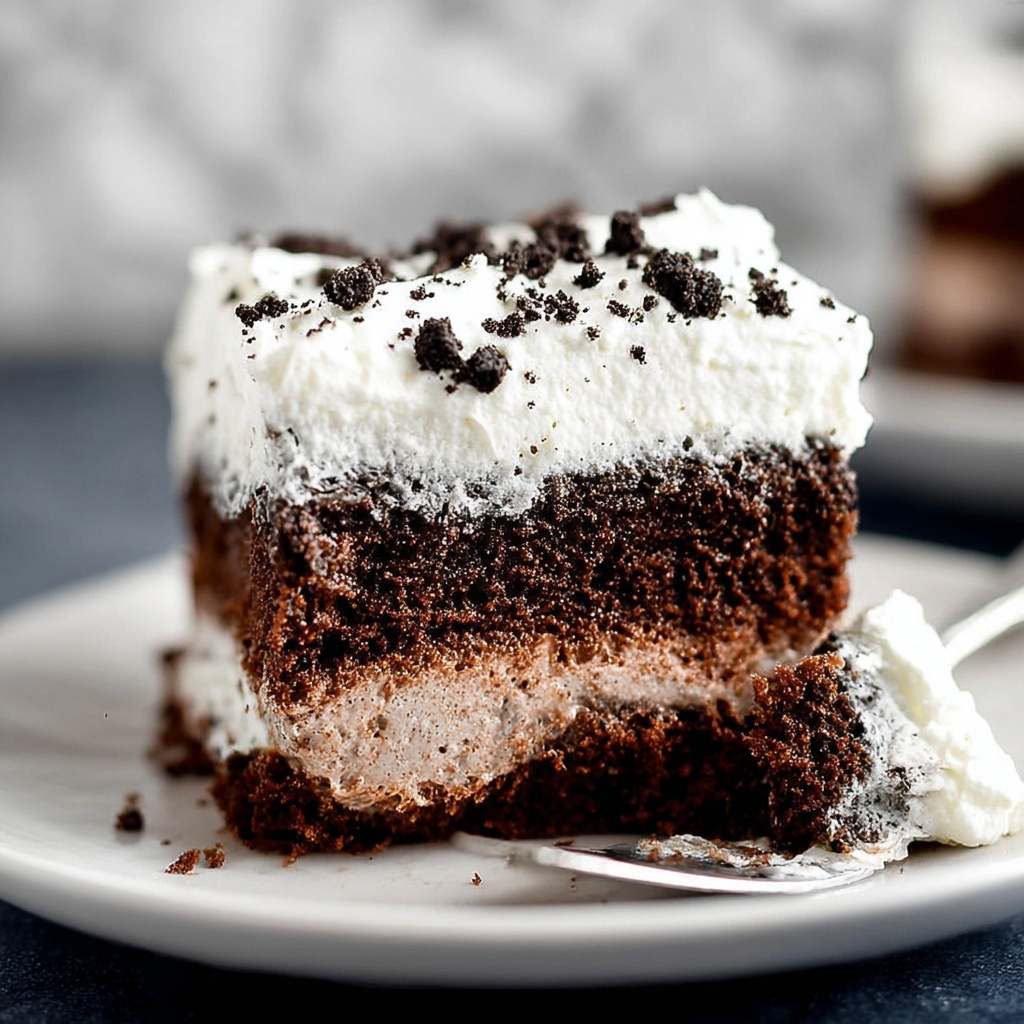Oreo Pudding Poke Cake Recipe - Recipe Image